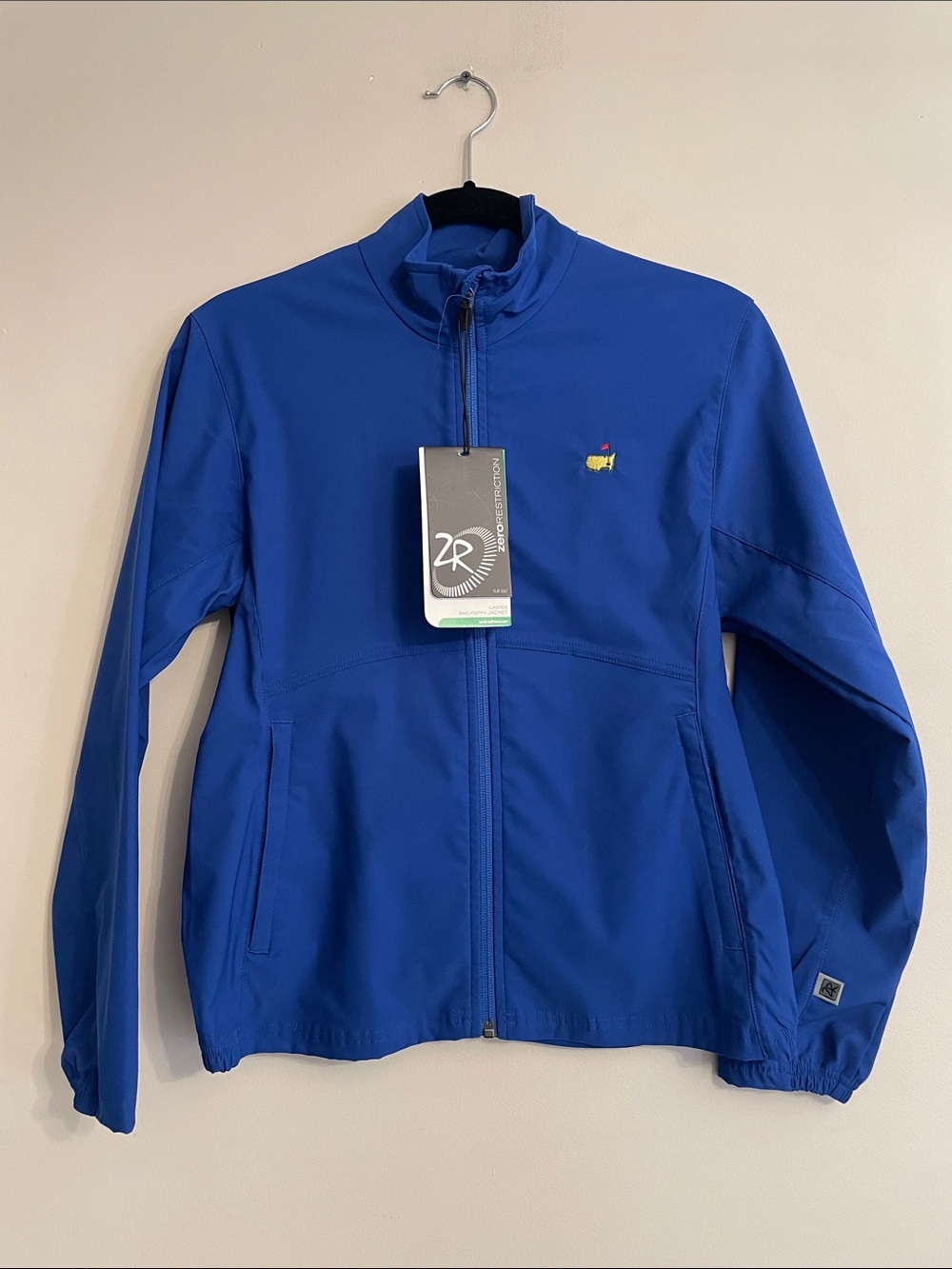 NWT Womens Zero Restriction Masters Golf Backspin Windwear Jacket Blue Small